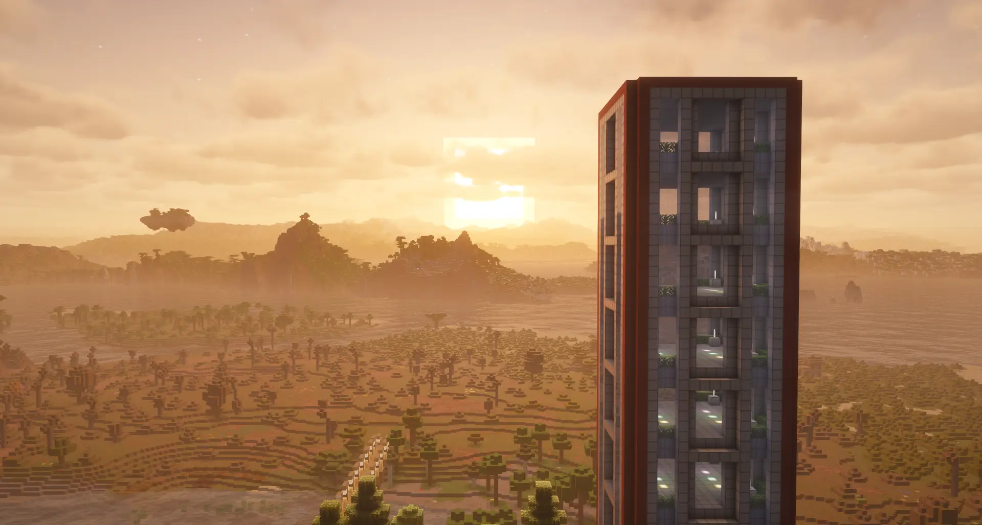 Minecraft Tall Battle tower looking across the sunset.