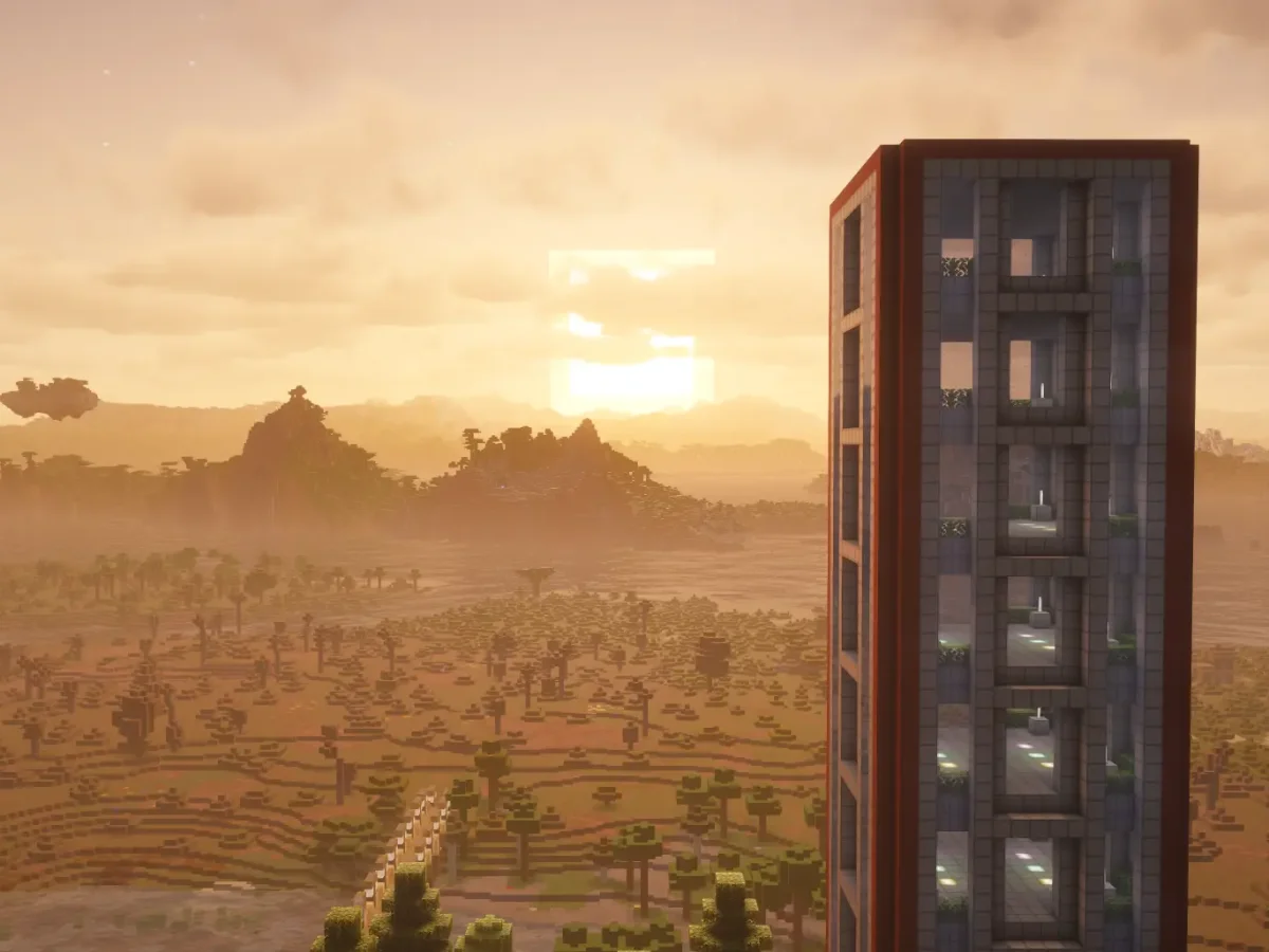 Minecraft Tall Battle tower looking across the sunset.